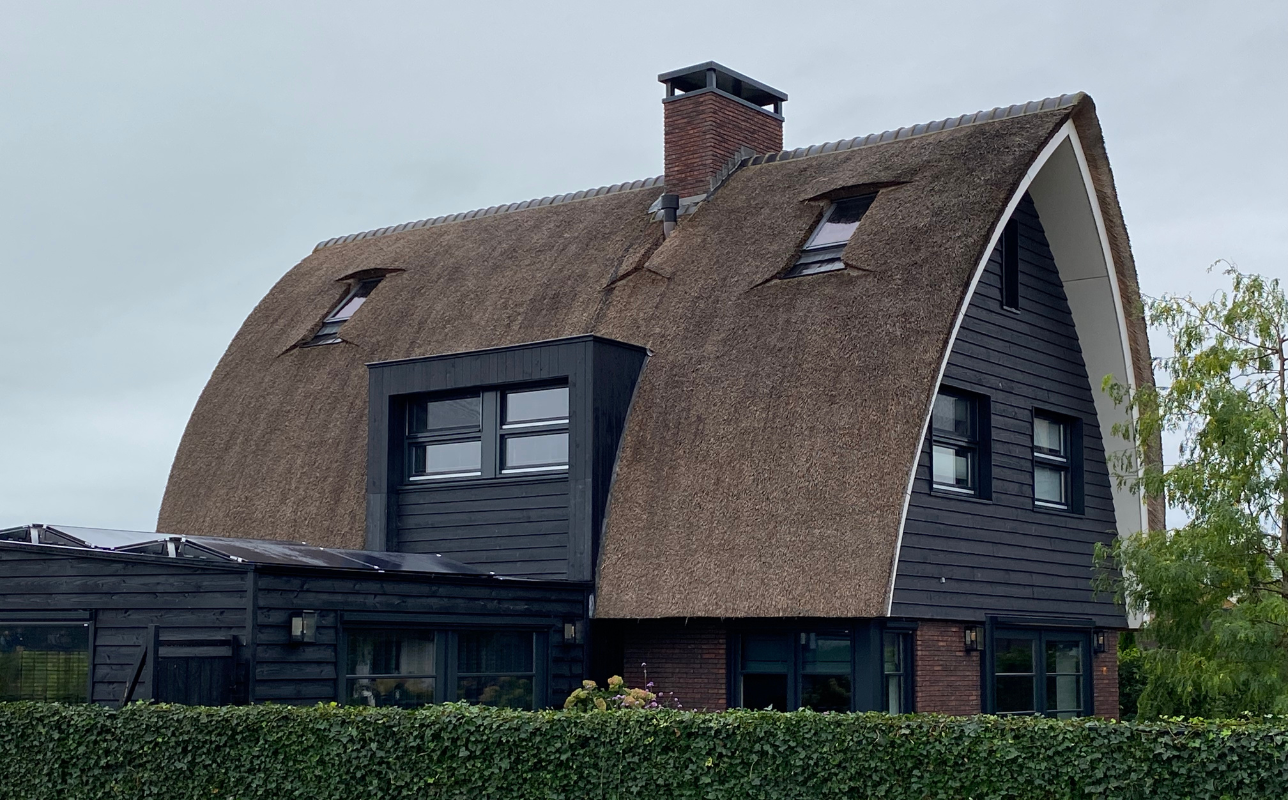 effectively combat the blaze and reach the top of the thatched roof.